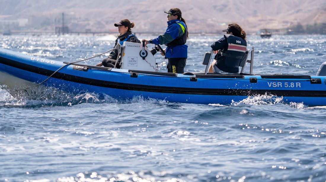 Coaches in a RIB at a regatta in Eilat
