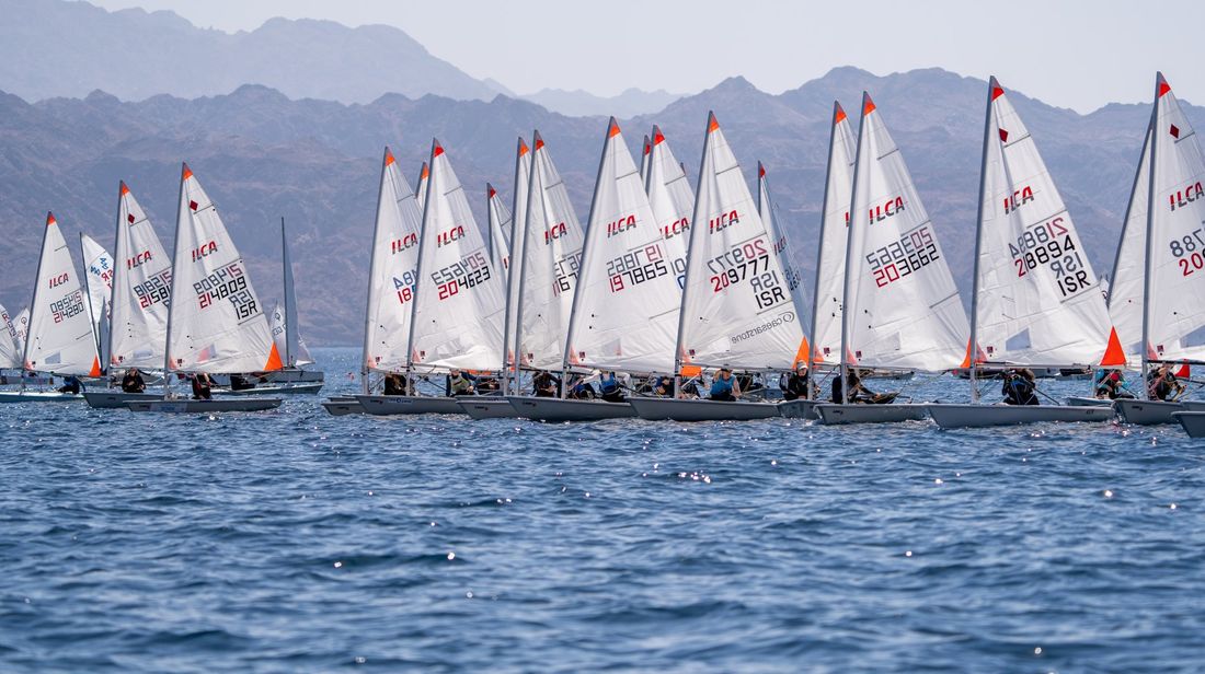 ILCA fleet lining up for a start in Eilat