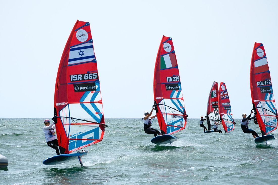 iQFoil windsurfers foiling at the 2026 European Championships in Portimão